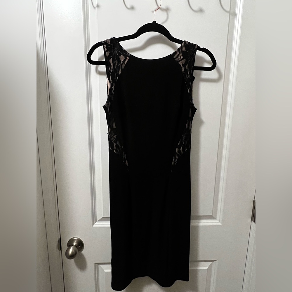Sheek and comfortable black midi dress! Made from great material, double lined.